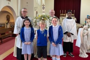 Our school family comes together to celebrate the Baptism of our pupils